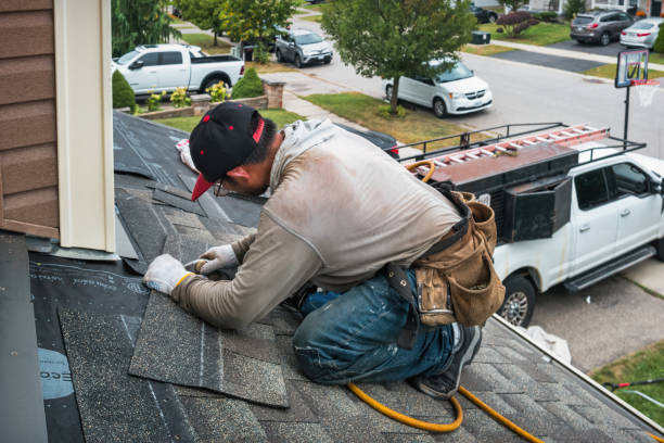 Professional Roofing technician working in Goshen, MA